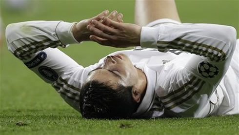 Cristiano Ronaldo layed on the ground and looking disappointed for Real Madrid to lose against Bayern Munich in the penalties shootout