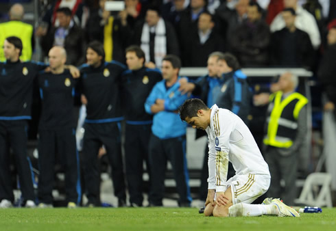 ACristiano Ronaldo on his knees disgusted for missing his penalty-kick against Bayern Munich, in the Champions League 2012