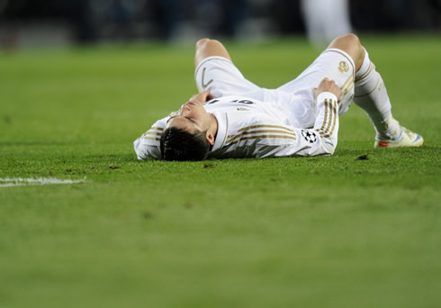 Cristiano Ronaldo layed on the ground, looking exhausted after Real Madrid loses against Bayern Munich in the UEFA Champions League semi-finals, in 2012