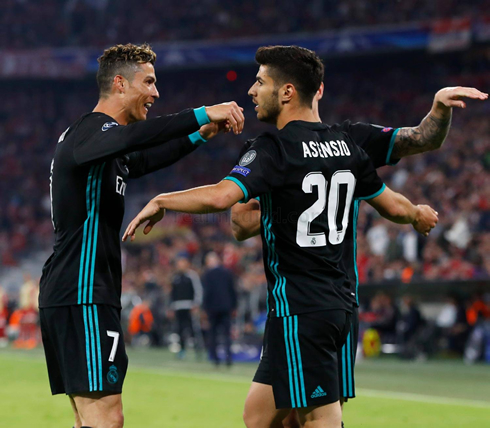 Cristiano Ronaldo congratulating Marco Asensio for his goal against Bayern Munich