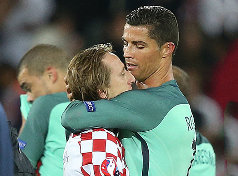 Cristiano Ronaldo comforting Luka Modric with a hug, after Portugal eliminated Croatia in the EURO 2016