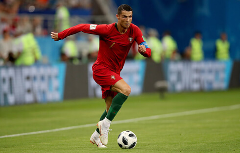 Cristiano Ronaldo moving the ball forward in a Portugal game at the 2018 FIFA World Cup
