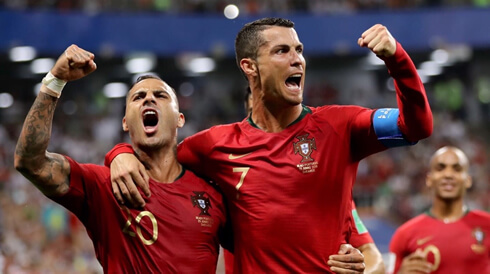 Quaresma and Ronaldo celebrate Portugal goal against Iran in the 2018 FIFA World Cup