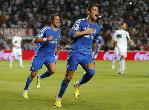 Cristiano Ronaldo tapping his chest after scoring the a penalty-kick in injury time, in a 1-2 win from Real Madrid against Elche