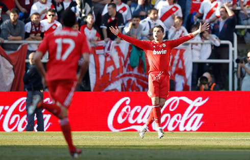 Cristiano Ronaldo with his arms wide open as he scores for Real Madrid