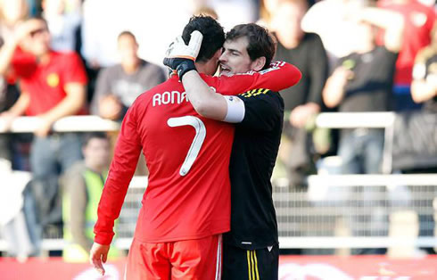 Cristiano Ronaldo hugging Iker Casillas in a Real Madrid match against Rayo Vallecano in 2012