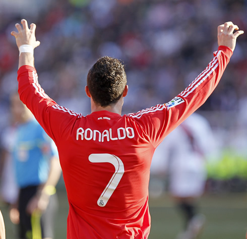 Cristiano Ronaldo doing the claw celebration in a Real Madrid red jersey/shirt in 2012