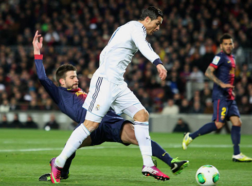 Cristiano Ronaldo getting tripped by Gerard Piqué and earning a penalty-kick, in Barcelona vs Real Madrid, for the Copa del Rey in 2013