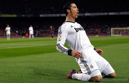 Cristiano Ronaldo pulling off his trademark sliding knee goal celebration at the Camp Nou, in Barcelona 1-3 Real Madrid, in 2013