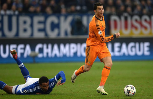 Cristiano Ronaldo dribbling a defender and leaving him lied on the ground