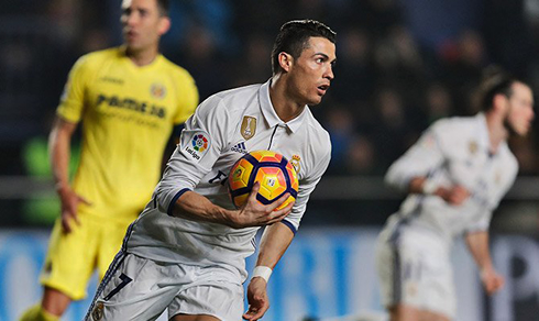 Cristiano Ronaldo grabbing the ball and tracking back to his side of the pitch