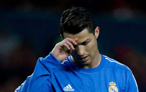 Cristiano Ronaldo scratching his forehead after the disappointing loss against Sevilla