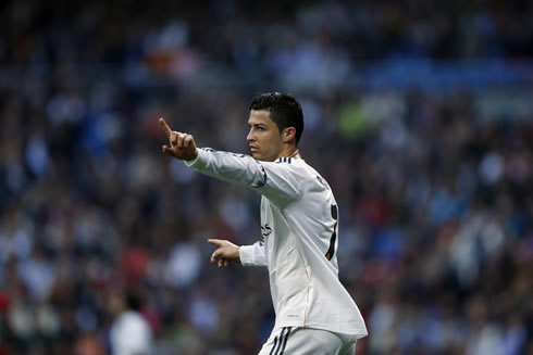 Cristiano Ronaldo raising his finger and waving in discord with a referee decision