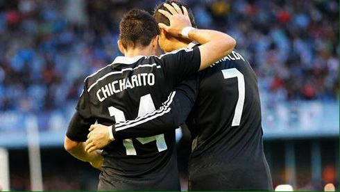 Chicharito and Cristiano Ronaldo hugging each other after a goal for Real Madrid