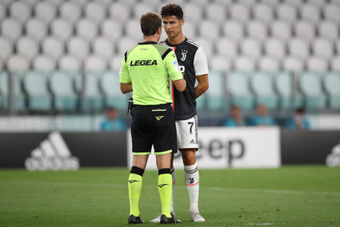 Cristiano Ronaldo having a talk with the referee