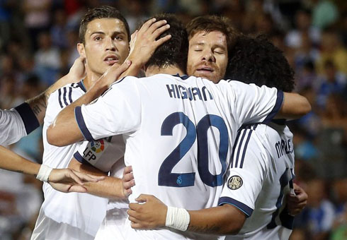 Cristiano Ronaldo, hugging Gonzalo Higuaín, Xabi Alonso and Marcelo, in Real Madrid 2012-2013