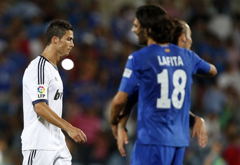 Cristiano Ronaldo walking away sad from the field, after a Real Madrid loss for La Liga 2012-2013