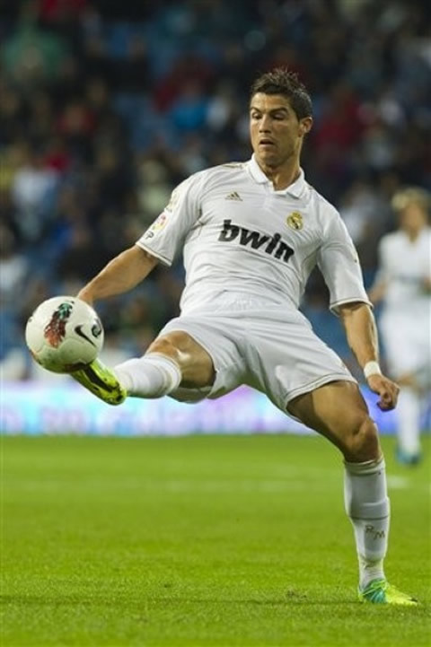 Cristiano Ronaldo reaches the ball with his right boot