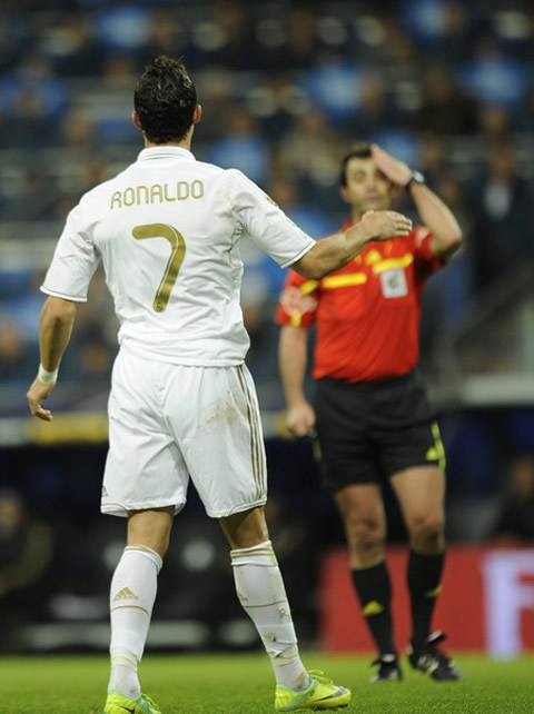 Cristiano Ronaldo waves at the referee in a La Liga game
