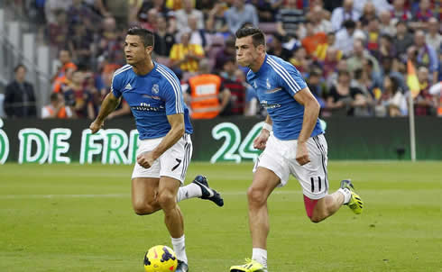 Cristiano Ronaldo and Gareth Bale sprinting during a warm-up session ahead of the Clasico Barça vs Real Madrid, in 2013