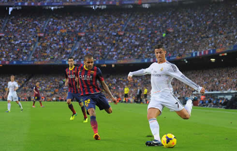 Cristiano Ronaldo playing against Barcelona in a packed Camp Nou