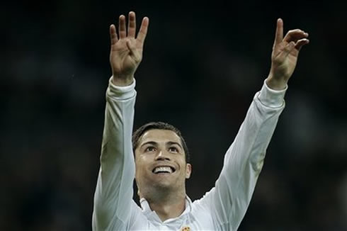 Cristiano Ronaldo raising his two hands to dedicate his goal