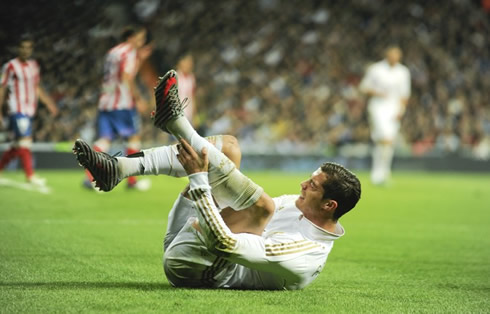 Cristiano Ronaldo injured, after being tackled by Perea, in Real Madrid vs Atletico Madrid in 2011-2012