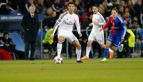 Cristiano Ronaldo moving the ball forward with his head held high
