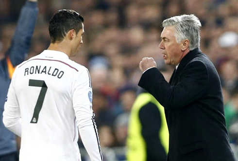 Cristiano Ronaldo receiving instructions from Carlo Ancelotti
