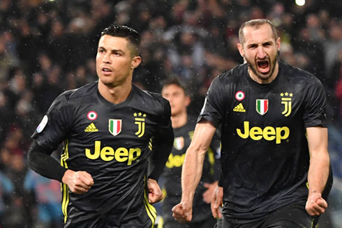 Cristiano Ronaldo and Giorgio Chiellini celebrate Juventus winning goal against Lazio