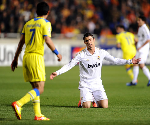 Cristiano Ronaldo on his knees complaining about something during a Real Madrid game for the UEFA Champions League