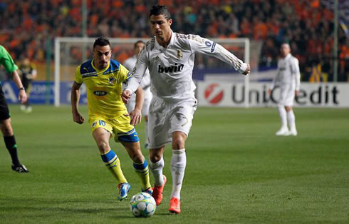Cristiano Ronaldo taking off as he escapes a defender in APOEL vs Real Madrid