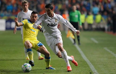 Cristiano Ronaldo leaving an APOEL defender behind, as he starts sprinting down the line