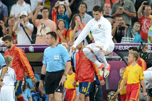 
Cristiano Ronaldo warm up jump, as the Portuguese and Spanish teams step up to the pitch and prepare to line-up for chanting the national hymns