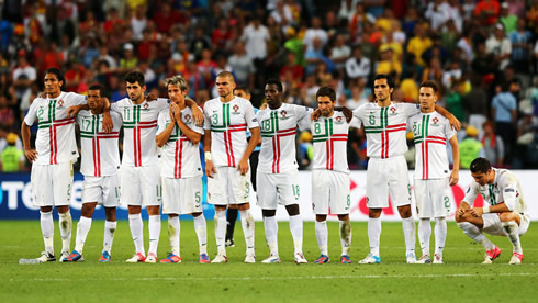 Cristiano Ronaldo suffering differently than the rest of his Portuguese teammates, as Portugal face Spain in the penalty shootout at the EURO 2012 semi-finals