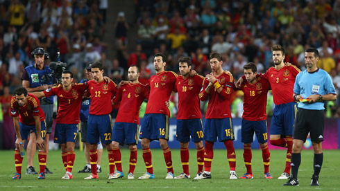 The Spanish National Team hugging each other, as they watch the penalty shootout between Spain and Portugal, at the EURO 2012 semi-finals