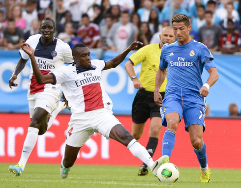 Cristiano Ronaldo challenging a loose ball, in PSG 0-1 Real Madrid, for the 2013-2014 pre-season tour