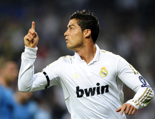 Cristiano Ronaldo pointing his finger to the sky after scoring a goal in 2011-2012