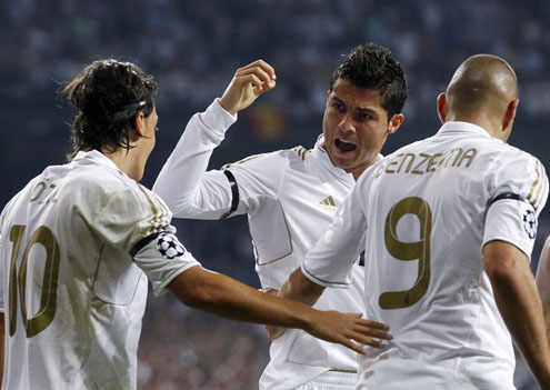 Cristiano Ronaldo congratulating Ozil for his work on Real Madrid's goal in 2011-2012