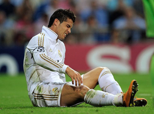 Cristiano Ronaldo injured and layed on the ground against Ajax, in the UEFA Champions League 2011-2012