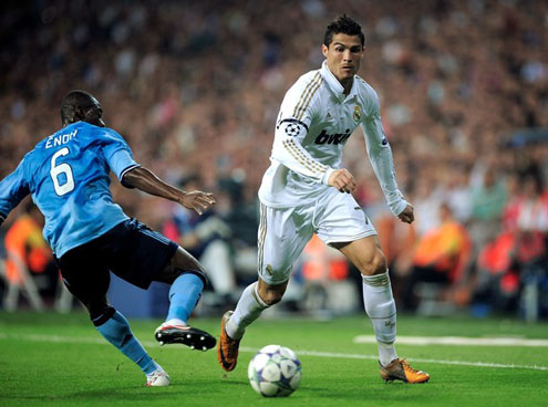 Cristiano Ronaldo dribbling a defender from Ajax, in the UEFA Champions League match in 2011-2012