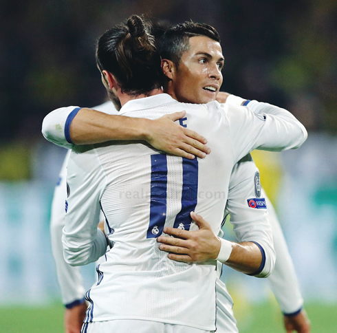 Gareth Bale and Cristiano Ronaldo hugging each other in a Champions League game for Real Madrid in 2016