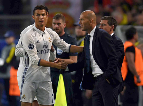 Cristiano Ronaldo greeting Zidane after scoring in Dortmund, in a Champions League night game