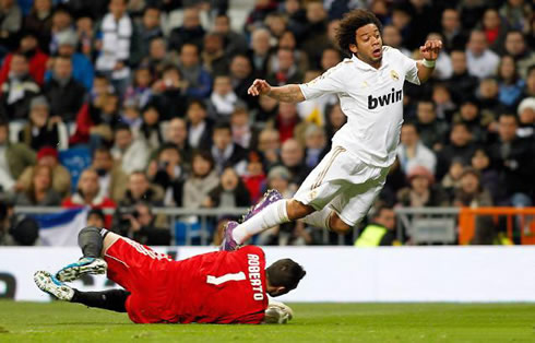 Marcelo diving after Roberto got to the ball before him, in Real Madrid 3-1 Zaragoza, for La Liga in 2012