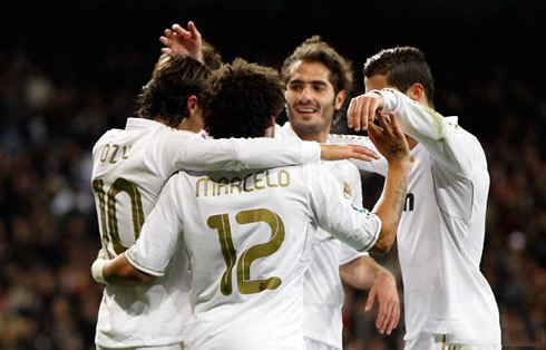 Cristiano Ronaldo, Altintop, Ozil and Marcelo, Real Madrid group hug when celebrating a goal for the team