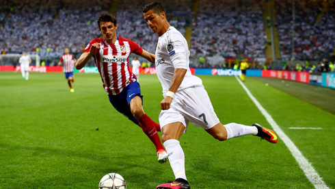 Cristiano Ronaldo running down the left wing to cross the ball
