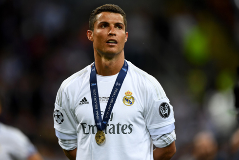 Cristiano Ronaldo wearing the Champions League winner medal around his neck