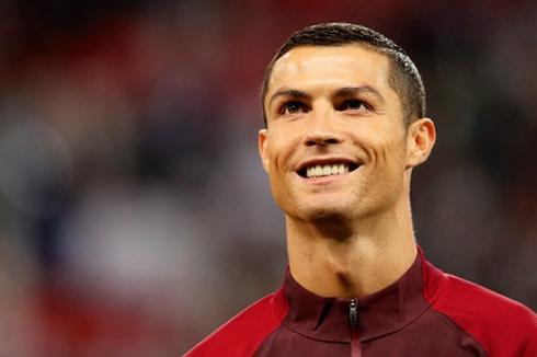Cristiano Ronaldo smiling to the crowd before a game for Portugal in 2017