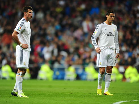 Cristiano Ronaldo and Gareth Bale, standing next to each other, in Real Madrid 2013-2014