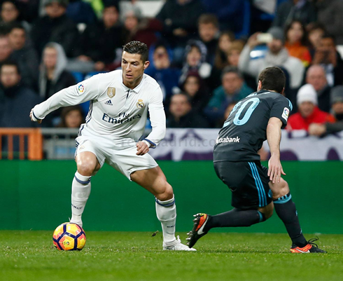 Cristiano Ronaldo dribbling a defender in Real Madrid vs Real Sociedad